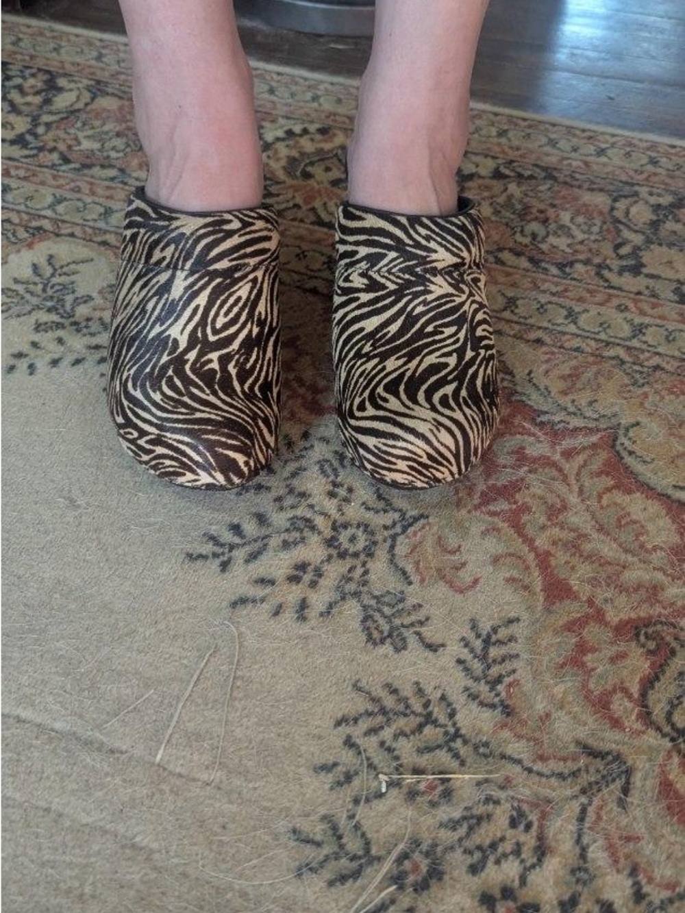 Dansko Zebra Print Slip-On Clogs in Black and Cream